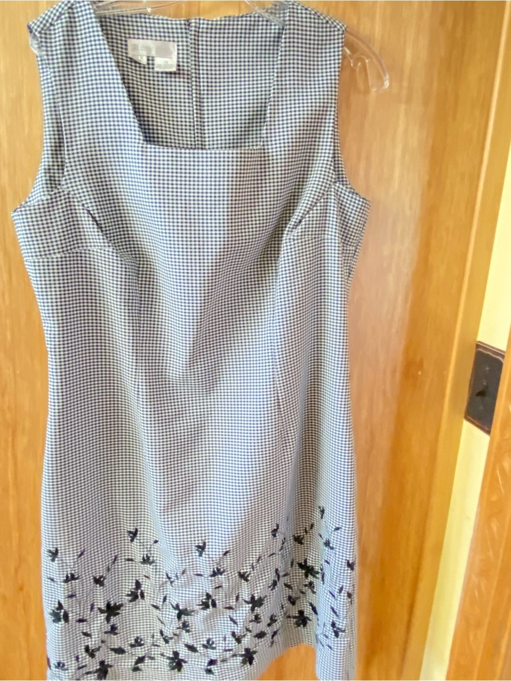 Sleeveless black Gingham Shift Dress with Floral Hem.  Bust-line is 20” across.